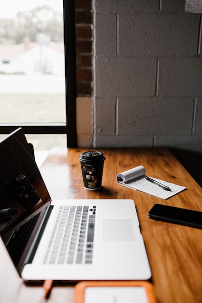 Workspace with laptop and coffee